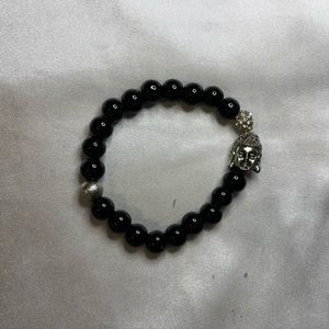 Jet black beaded bracelet, with Buddha accent bead